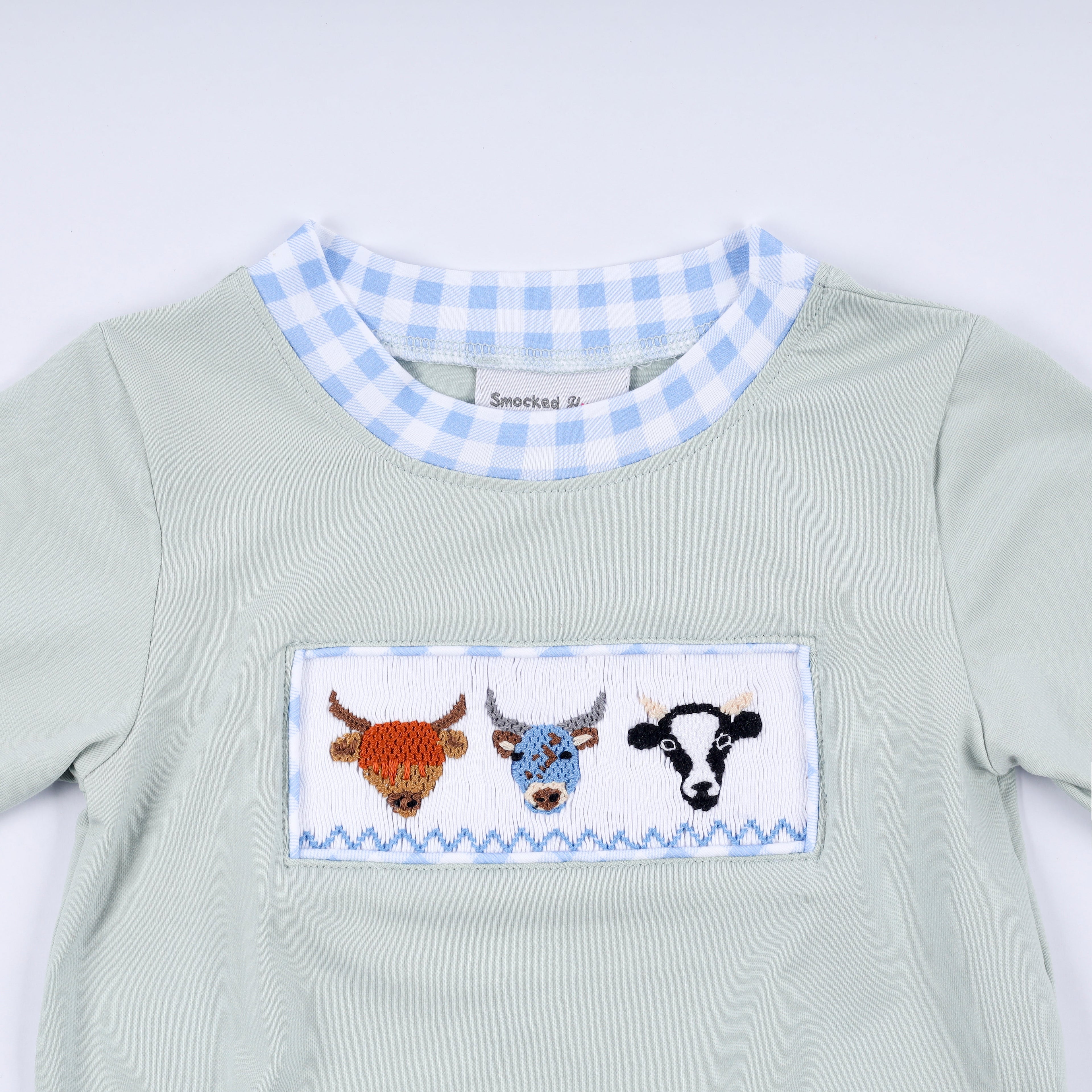 Sage cow hand smocked bubble